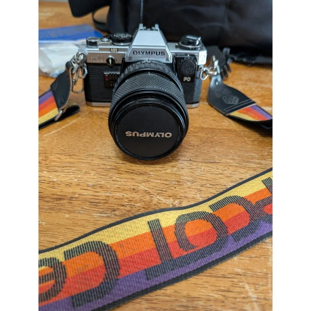 Vintage Olympus OM-10 Film Camera & 3-Lens Kit Bundle with Disney EPCOT Strap